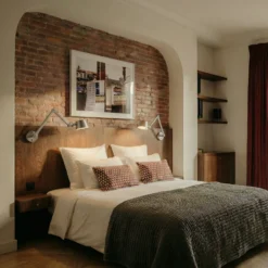 Aplique de pared Lucande Silka, 91 cm, níquel, regulable, E27