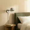 Aplique de pared Lucande Silka, 14 cm, níquel, flexible, enchufe
