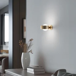 Aplique de pared Mado, acero color latón, cristal opalino, 1 luz