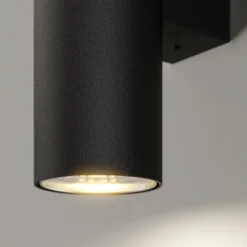 Aplique de pared Marion de Euluna, negro, altura 18 cm, acero, luz hacia