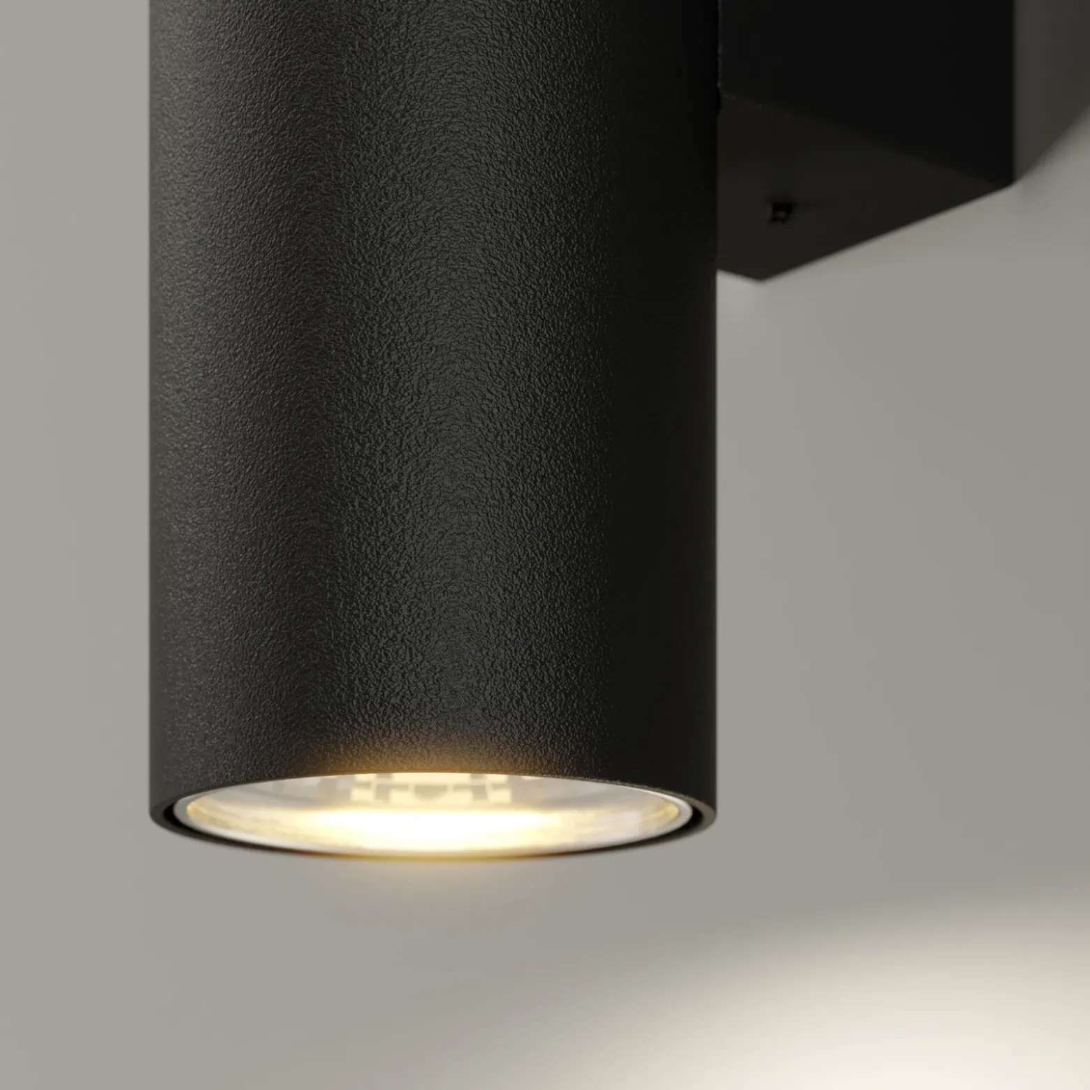 Aplique de pared Marion de Euluna, negro, altura 18 cm, acero, luz hacia