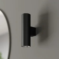 Aplique de pared Marion de Euluna, negro, altura 18 cm, acero, luz hacia