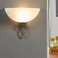 Aplique de pared Mohija de Lindby, 25 cm, negro/dorado, cristal, E27