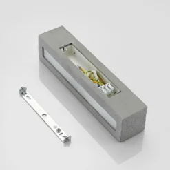 Aplique de pared Nellie de Lindby, gris, hormigón, 35,3 cm de ancho
