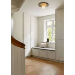 Aplique de pared Nuura Liila Muuse, Ø 42 cm, IP44, dorado/ópalo