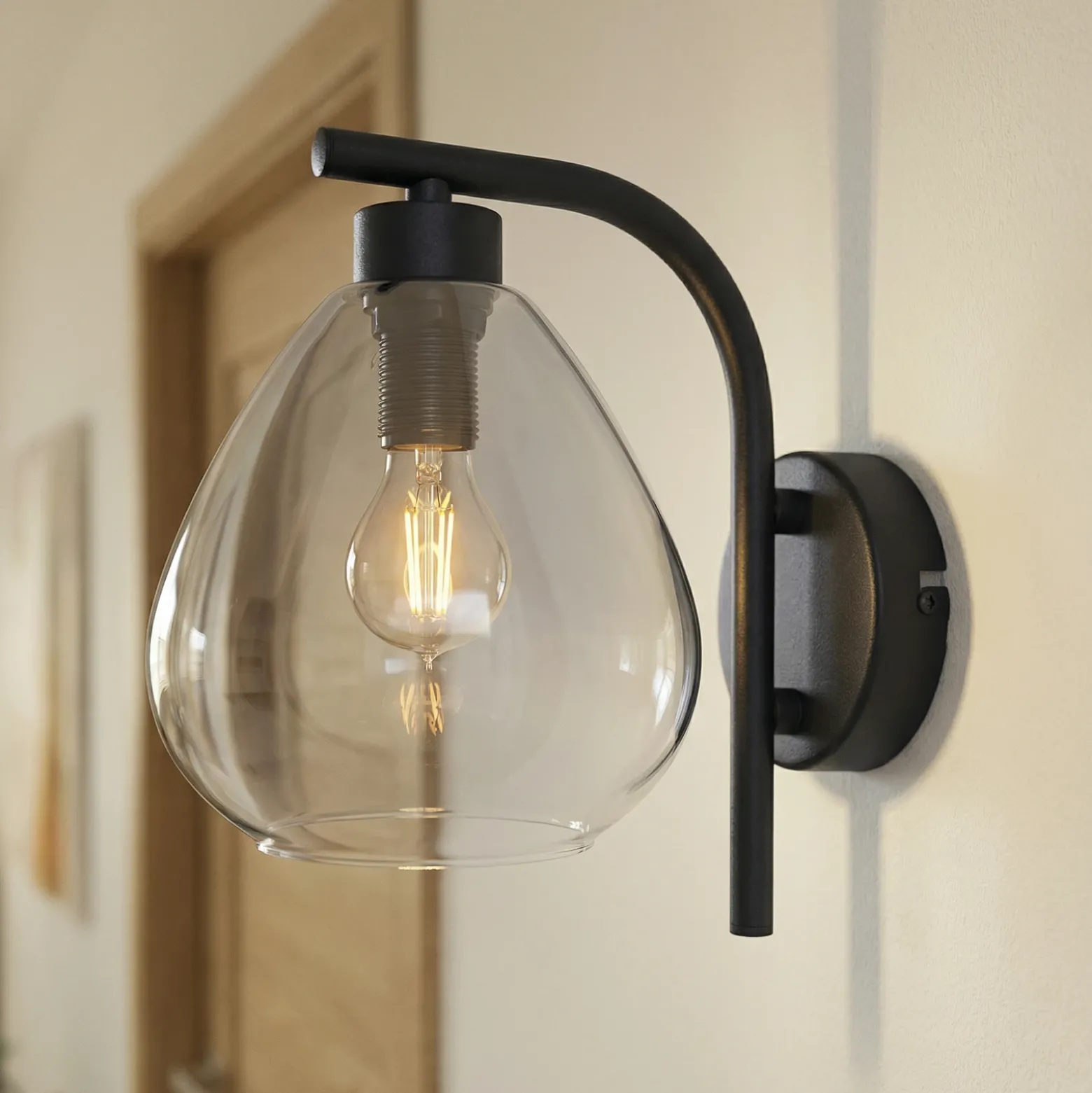 Aplique de pared Pendura de Lindby, Ø 15 cm, negro, cristal