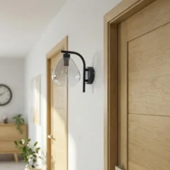 Aplique de pared Pendura de Lindby, Ø 15 cm, negro, cristal