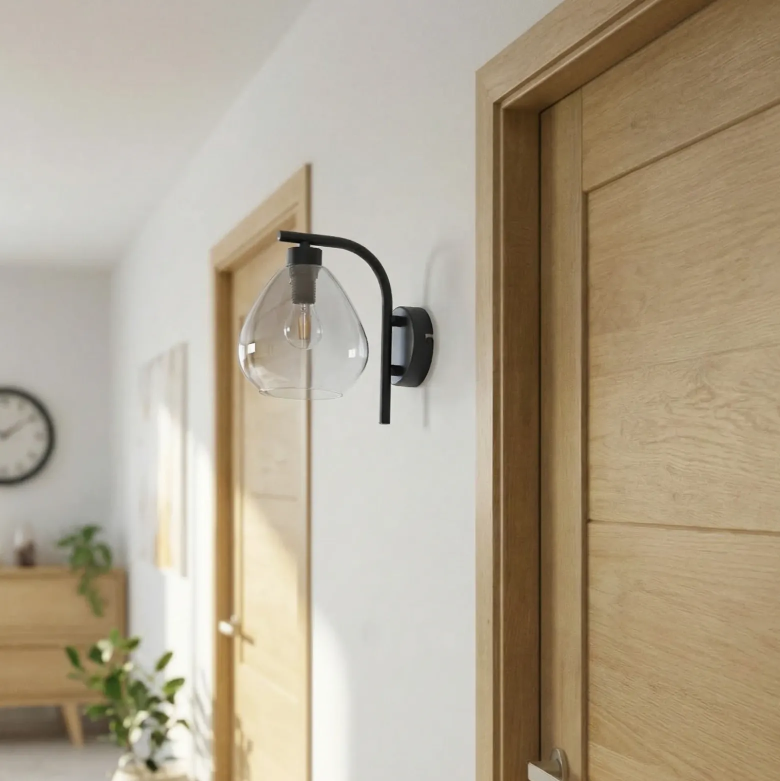 Aplique de pared Pendura de Lindby, Ø 15 cm, negro, cristal