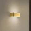 Aplique de pared Rauma, latón, 20 cm de ancho