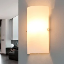 Aplique de pared Sidra de Lucande, altura 28 cm, cristal, semicircular
