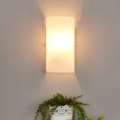 Aplique de pared Sidra de Lucande, altura 28 cm, cristal, semicircular