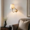 Aplique de pared Sofia Ecrie, color beige/dorado, tela, acero, E27