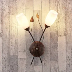 Aplique de pared Stefania de Lindby, negro/dorado, cristal, E14, 42,5 cm