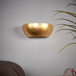 Aplique Kolja con acabado en oro batido