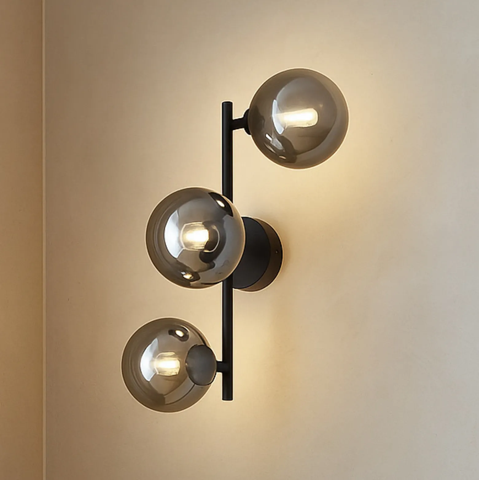 Aplique Lindby Orbelia, negro, 3 luces, cristal, G9