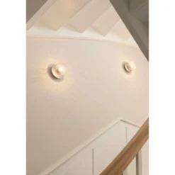 Aplique Nuura Liila 1, Ø 14 cm, IP44, plateado/transparente