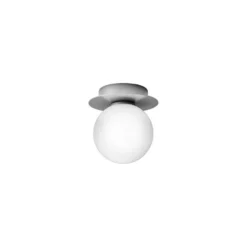 Aplique Nuura Liila 1 IP44, Ø 14 cm, plateado/ópalo