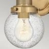 Aplique para baño Poppy, 1 luz, latón