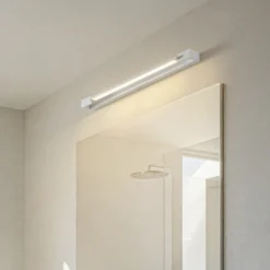 Arcchio Aplique de pared LED Jora, 60 cm, blanco, orientable, IP44