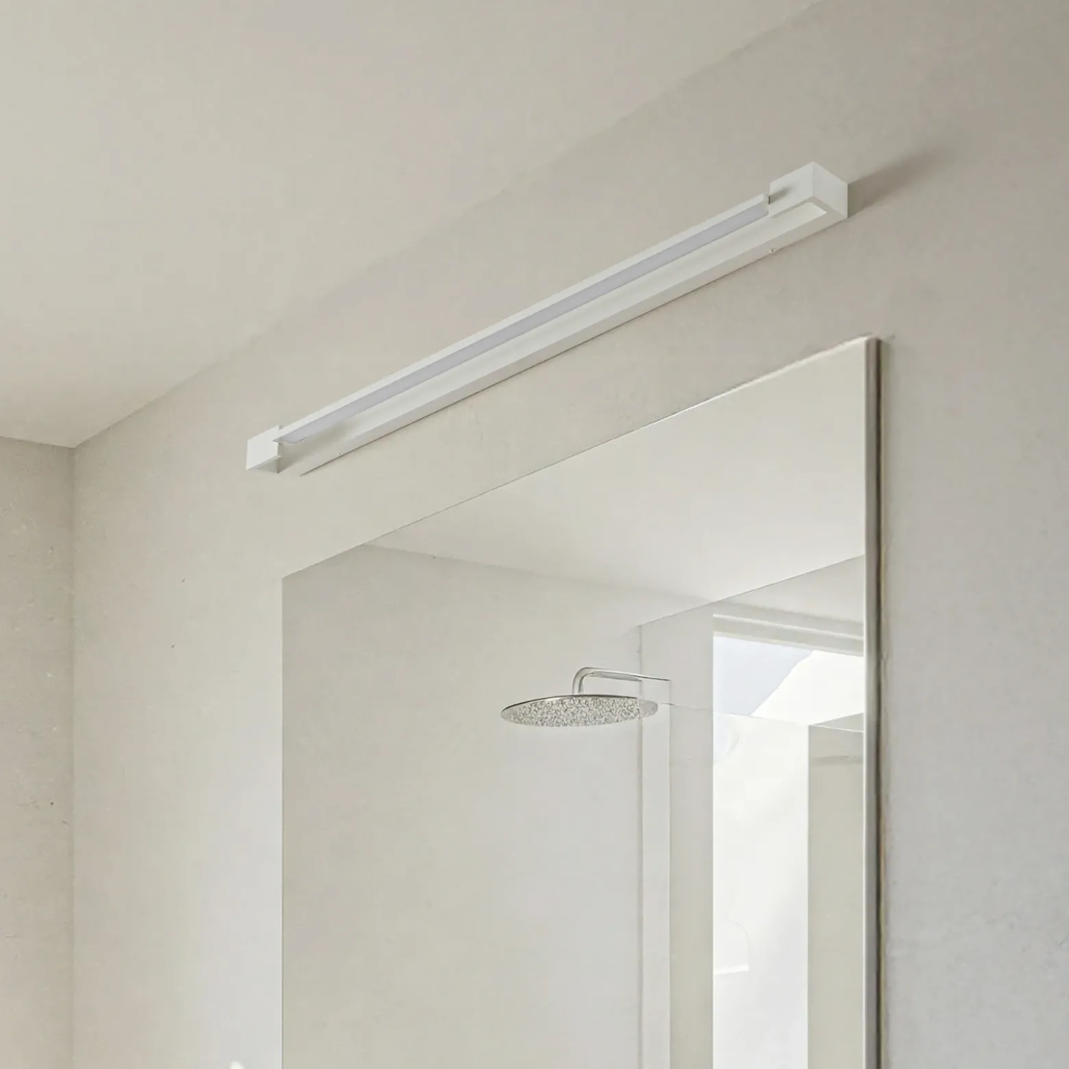 Arcchio Aplique de pared LED Jora, 90 cm, blanco, orientable, IP44