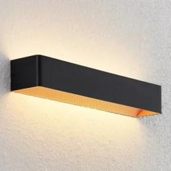 Arcchio Aplique de pared LED Karam, 53 cm, negro, metal, arriba/abajo
