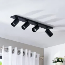 Arcchio Foco Brinja, negro, 65 cm de largo, Ø 7 cm, 4 luces.