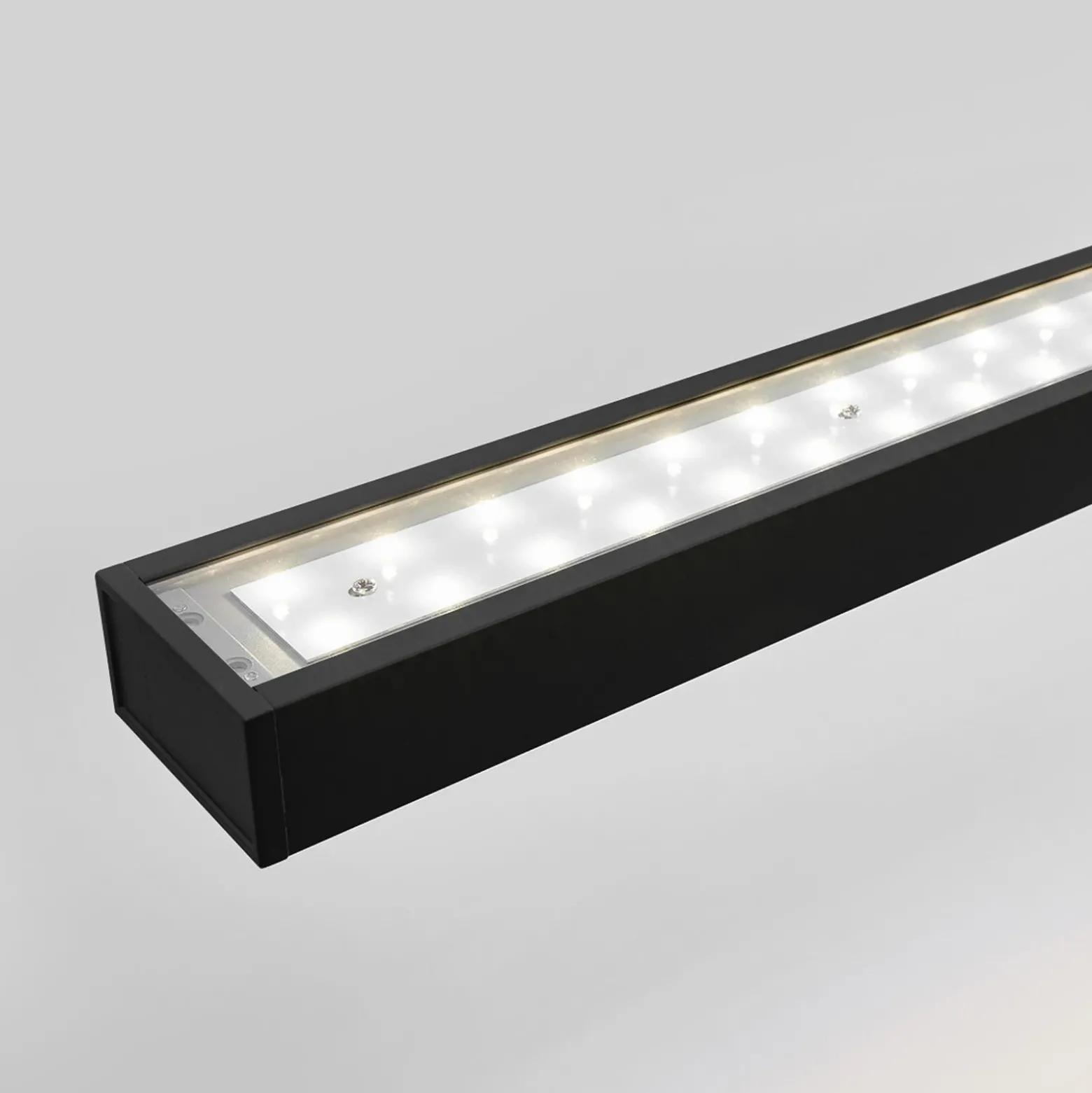 Arcchio lámpara colgante LED de oficina Jolinda, negra, 118cm, arriba/abajo