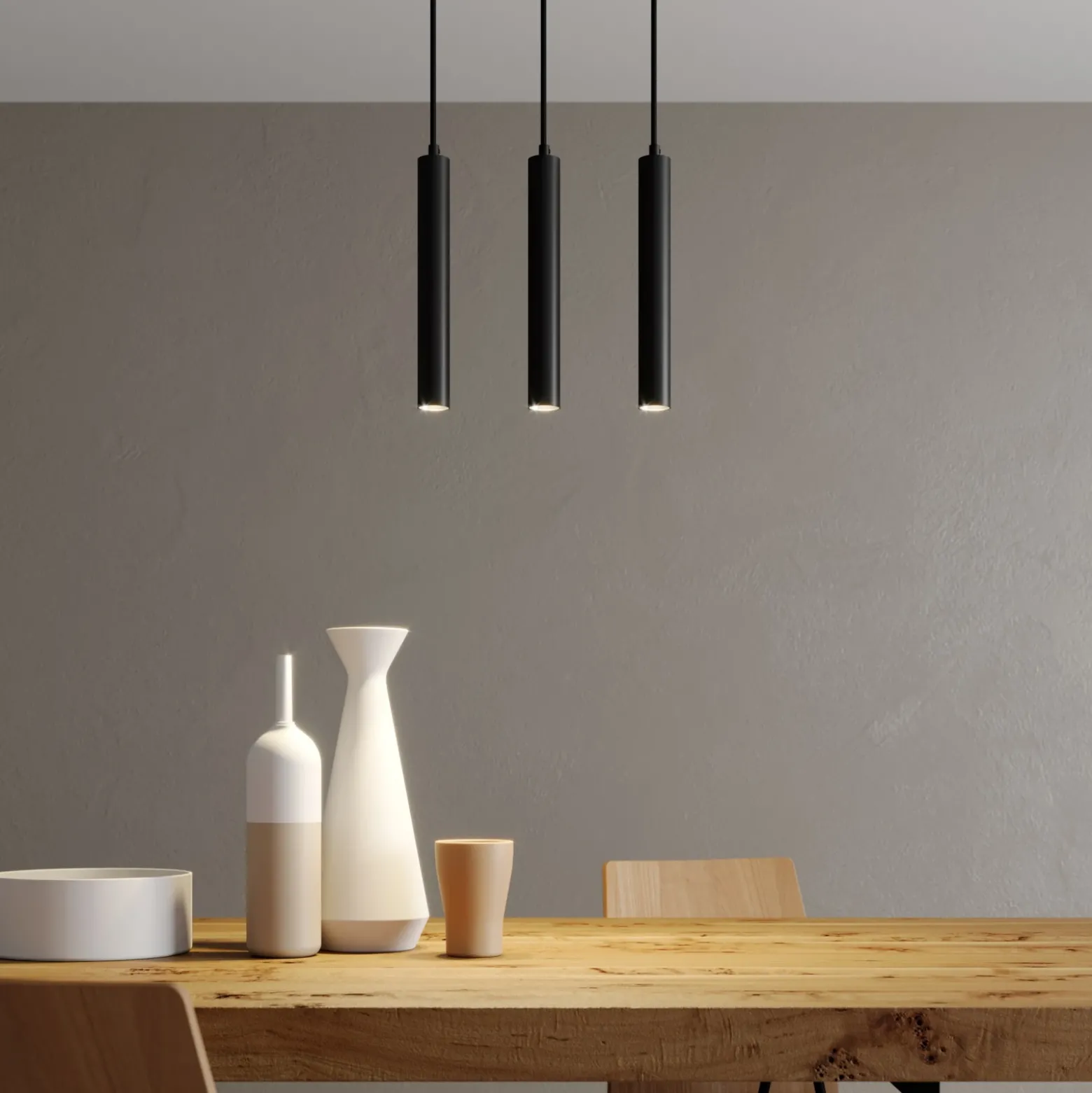 Arcchio Lámpara colgante LED Franka, 3 luces, larga, negra, aluminio