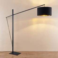 Arcchio lámpara de pie arqueada Mossa, 200 cm, negro-oro, textil
