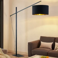 Arcchio lámpara de pie arqueada Mossa, 200 cm, negro-oro, textil