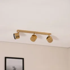 Downlight Chloe orientable, 3 luces, acero color latón