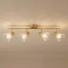 Downlight Margaux de Lindby, 4 luces, latón/transparente, cristal