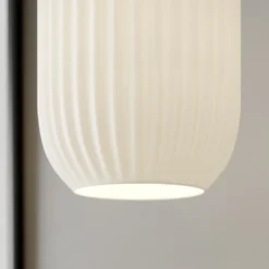 Dyberg LARSEN Lámpara colgante de cristal Riflet, Ø 14 cm