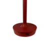Dyberg Larsen Lámpara de mesa LED recargable Flow, roja, altura 25 cm