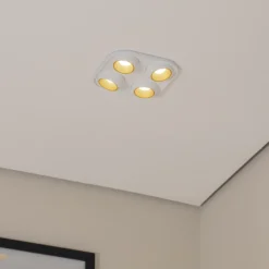 Foco empotrable Bega LED Studio Line, blanco/latón, 4 luces.
