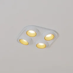 Foco empotrable Bega LED Studio Line, blanco/latón, 4 luces.