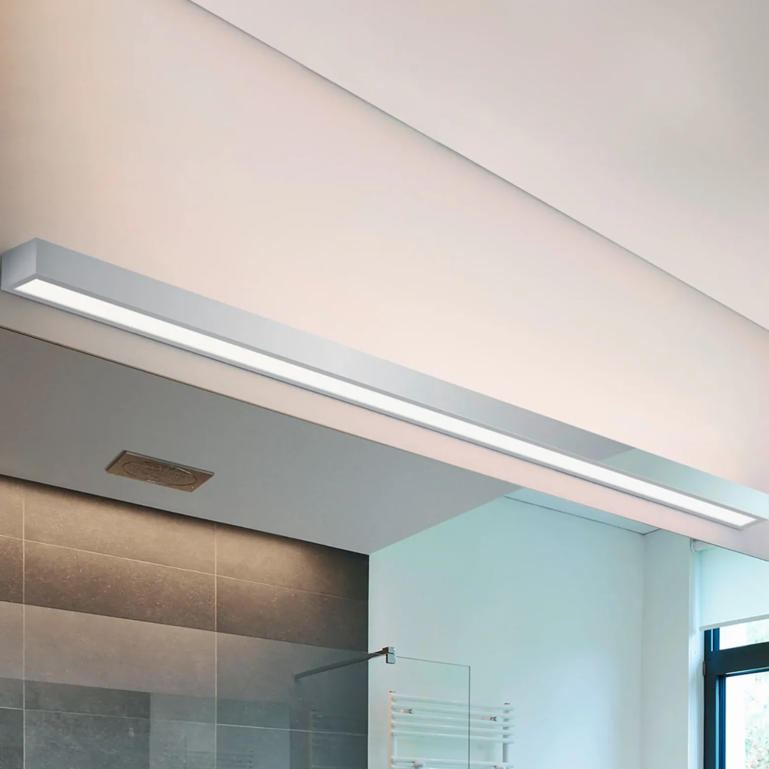 Helestra Theia lámpara de espejo LED cromado 120cm