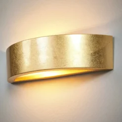 Jasin: aplique con superficie dorada