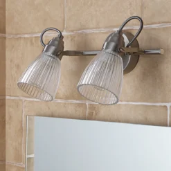 Lindby Aplique para baño Kara, 31 cm, 2 luces, cristal, IP44, G9