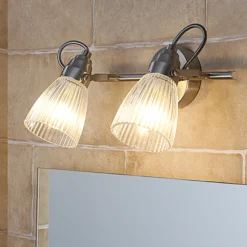 Lindby Aplique para baño Kara, 31 cm, 2 luces, cristal, IP44, G9