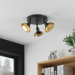 Lindby Erin downlight de techo, negro/oro, Ø 22 cm, cristal