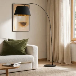 Lindby Esti lámpara de pie, negro/oro, tela, altura 192cm