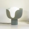 Lindby Fiora lámpara de mesa, verde, cristal, metal, Ø 20 cm