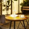 Lindby Lámpara de mesa LED recargable Evelen, blanca, IP54, CCT