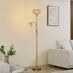 Lindby lámpara de pie Aliette, oro/ámbar, cristal, brazo de lectura