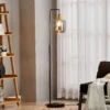 Lindby lámpara de pie Nimbora, 150 cm, negro, cristal, metal