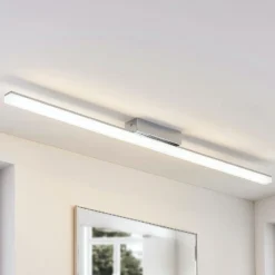 Lindby Lámpara de techo LED para baño Levke, 116 cm, atenuable, IP44