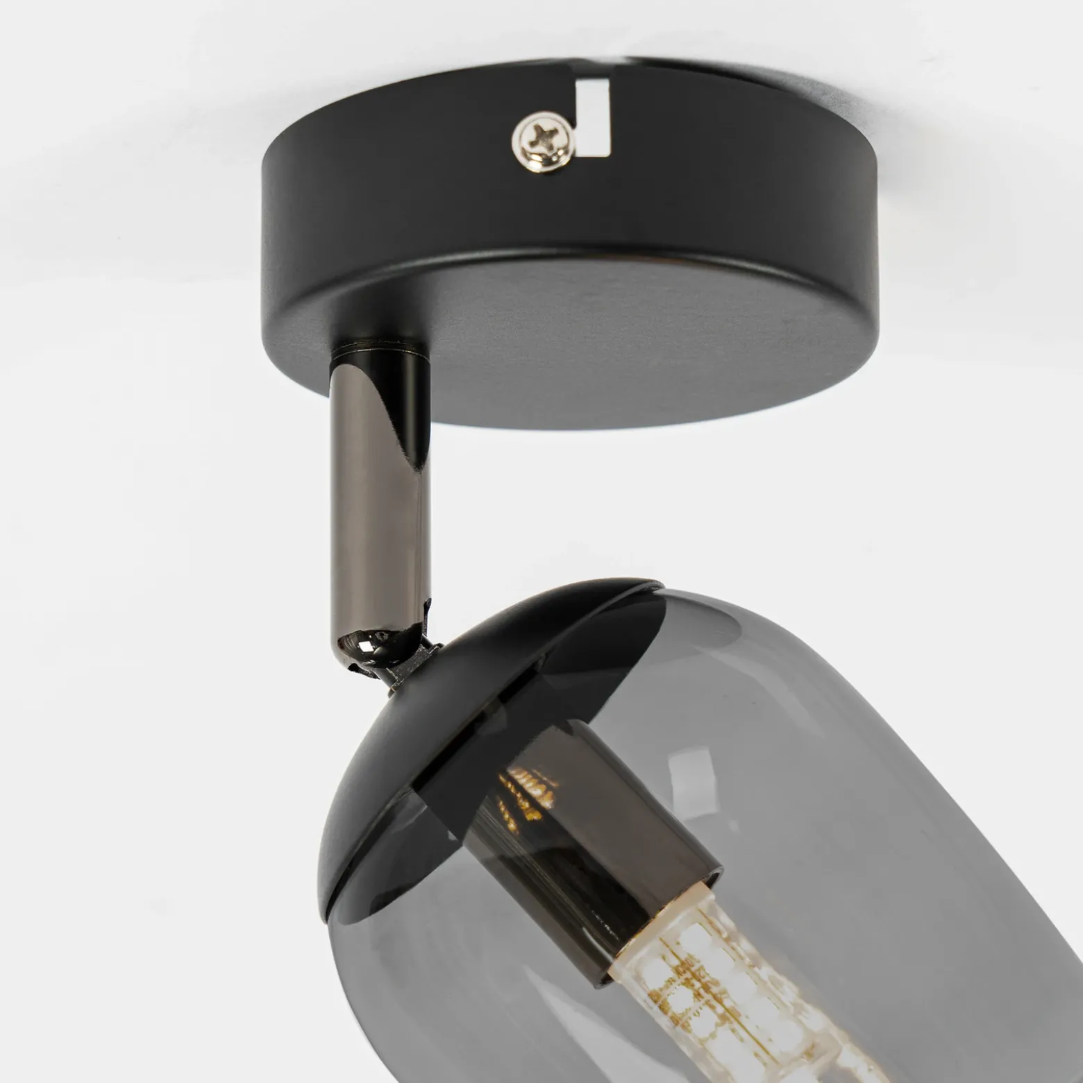 Lindby Spot Katjana, 1 luz, 16,9 cm de altura, cristal ahumado