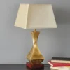 Llamativa lámpara de sobremesa Deco, base dorada