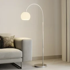 Lámpara arqueada Cynthia de Lindby, color níquel, cristal, 140 cm, E27